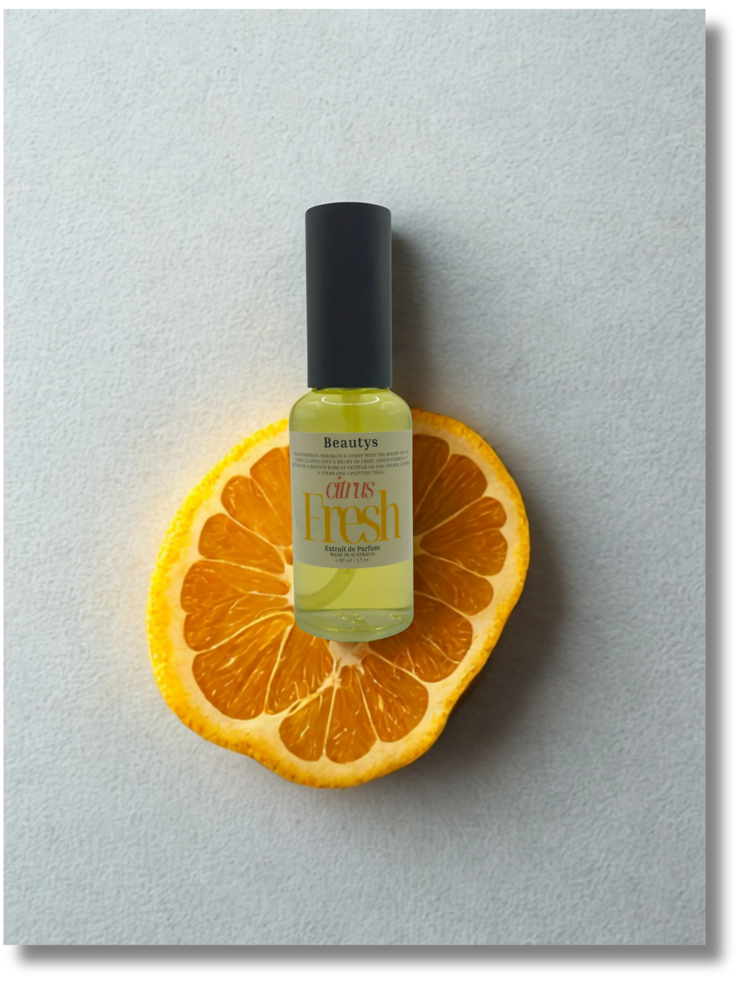 Beautys Citrus Fresh air freshener spray with a vibrant citrus fruit design on the label.