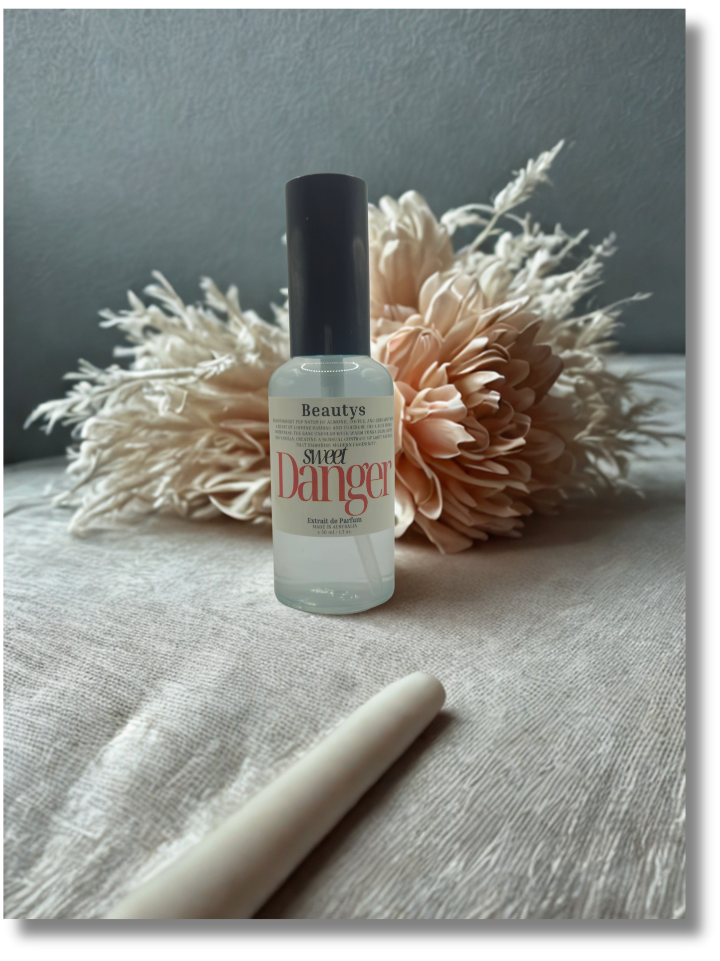 Close-up of Sweet Danger perfume showcasing Tasmanian-made cruelty-free craftsmanship.