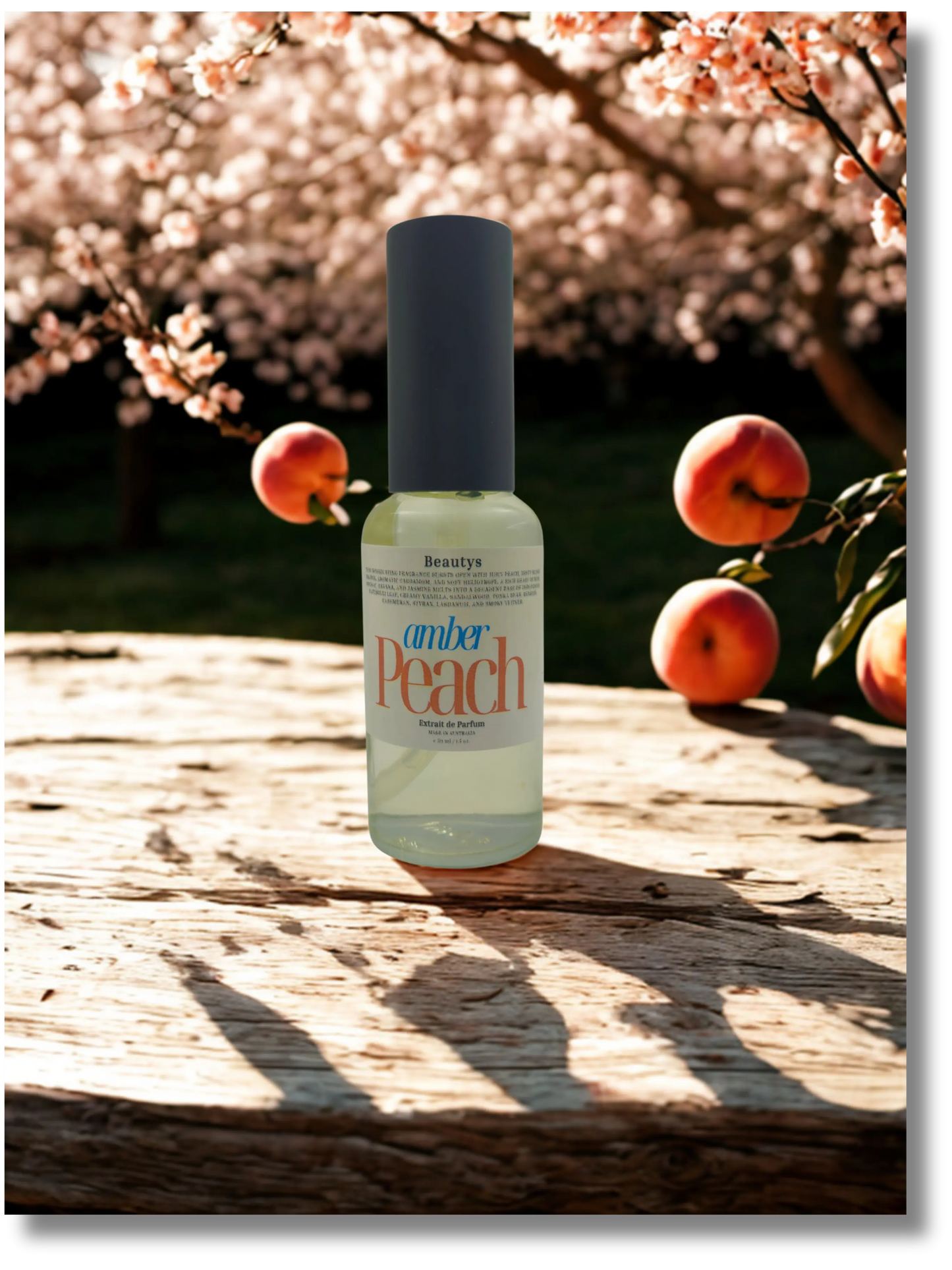 Beautys Amber Peach perfume bottle with a warm amber and peach-colored design, showcasing elegant branding.