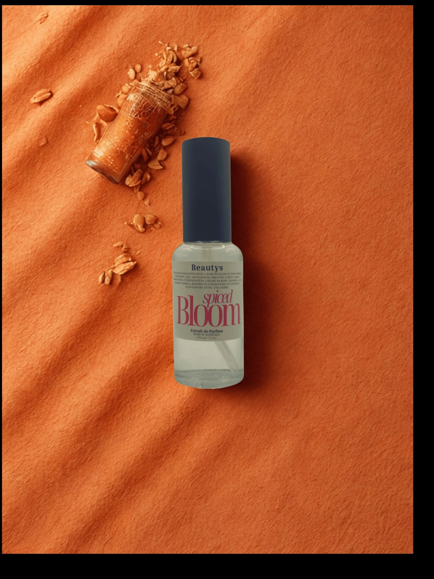 Beautys Spiced Bloom fragrance bottle with floral and spicy notes, elegant design, and vibrant packaging.