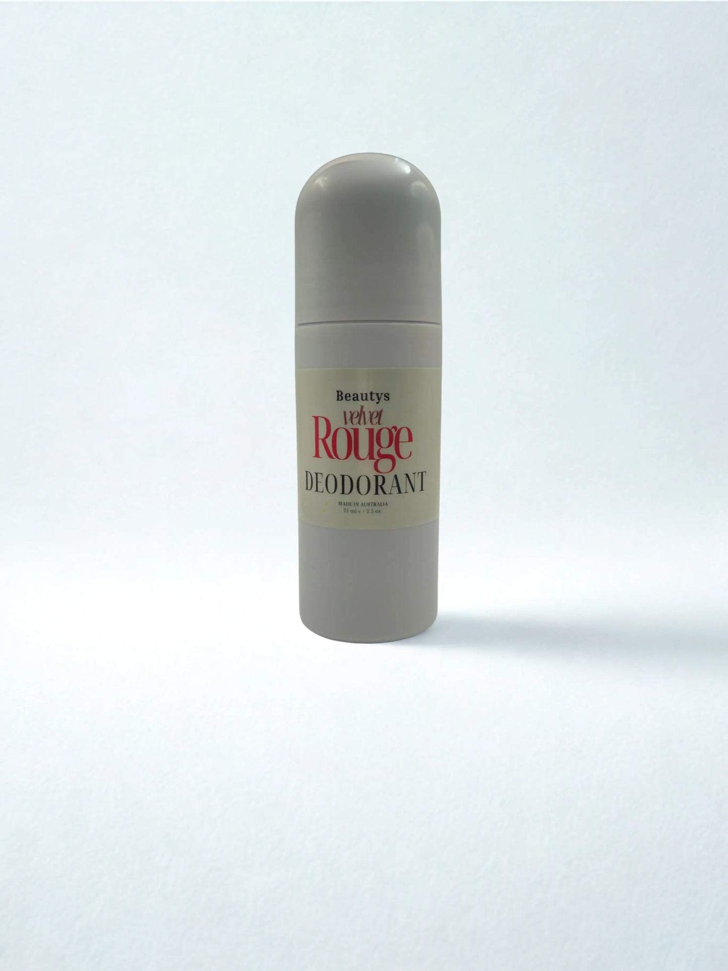Beautys Velvet Rouge Roll-On Deodorant bottle with red velvet design and clear cap, showcasing elegant packaging.