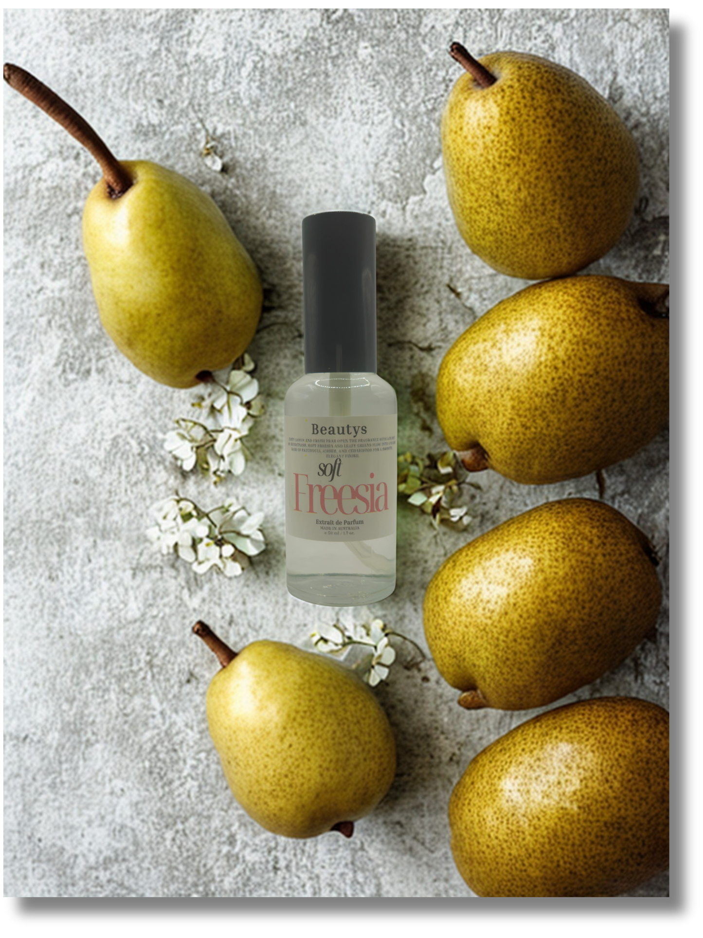 Beauty product bottle with pears and flowers on a textured surface
