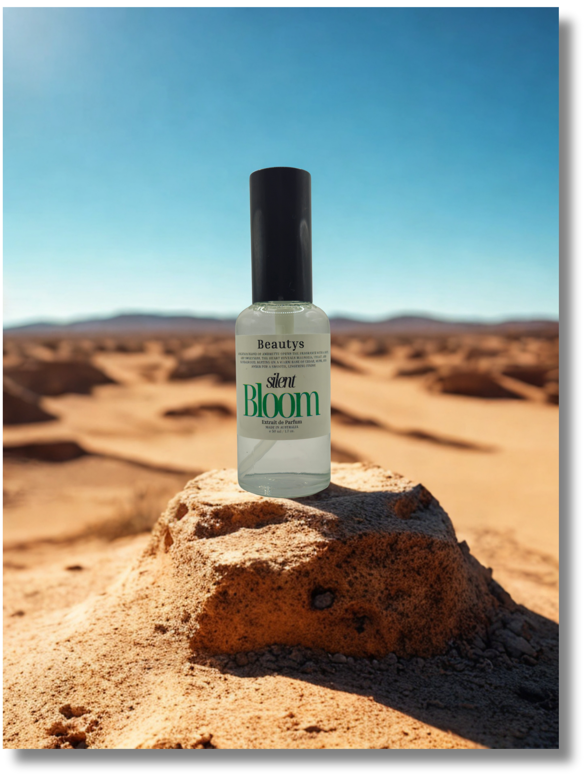 Silent Bloom bottle on a rock in a desert landscape