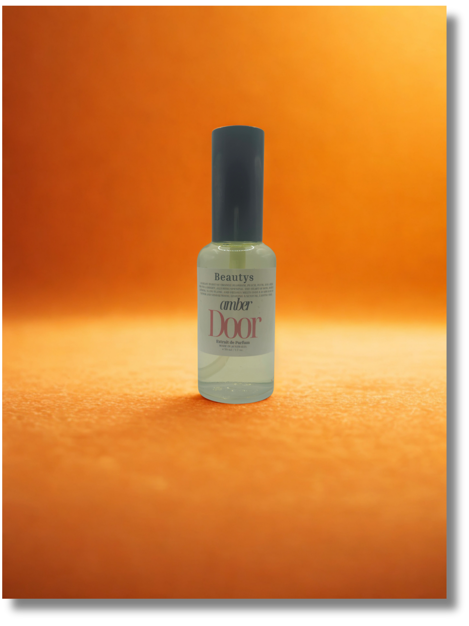 Bottle of 'amber door' on an orange background