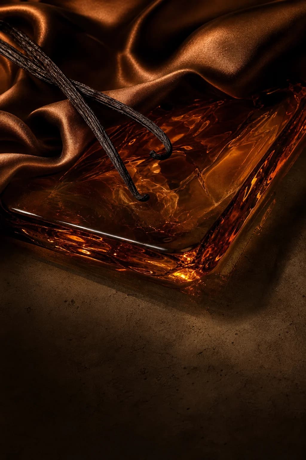 Editorial study of vanilla, amber glass and warm light