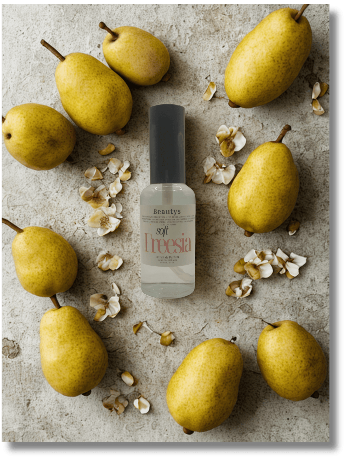 Freesia nail polish bottle surrounded by pears on a textured surface