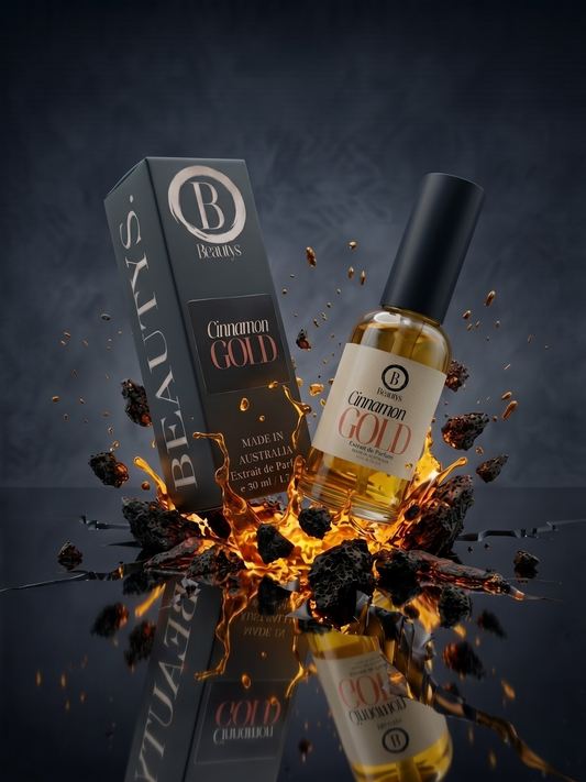 Bottle and box of Cinnamon Gold with fiery effects on a dark background