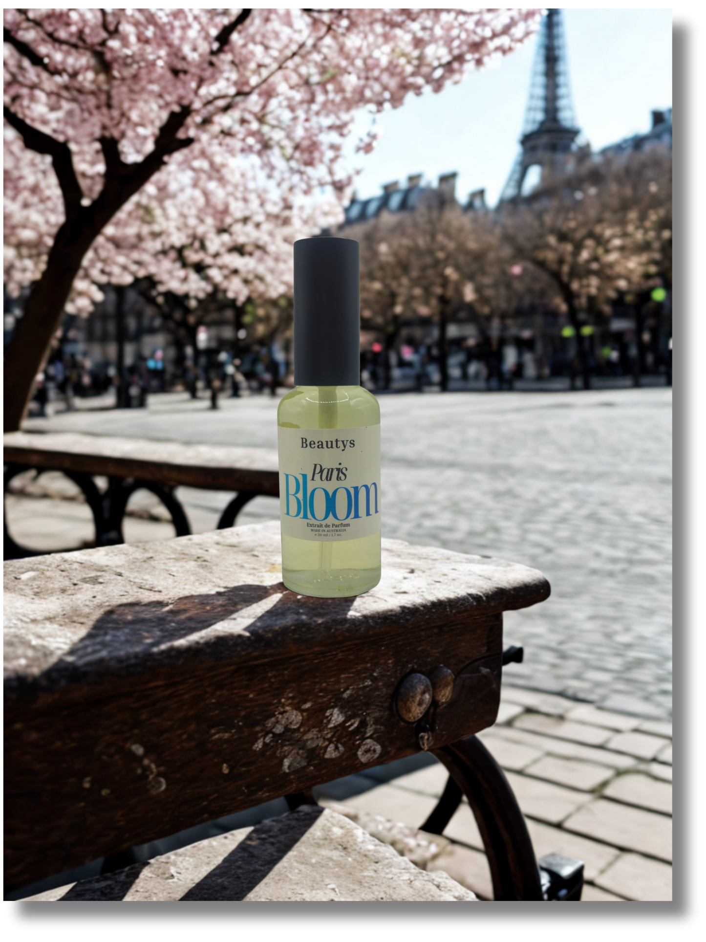 Paris Bloom luxury fragrance bottle styled with blossoms and citrus