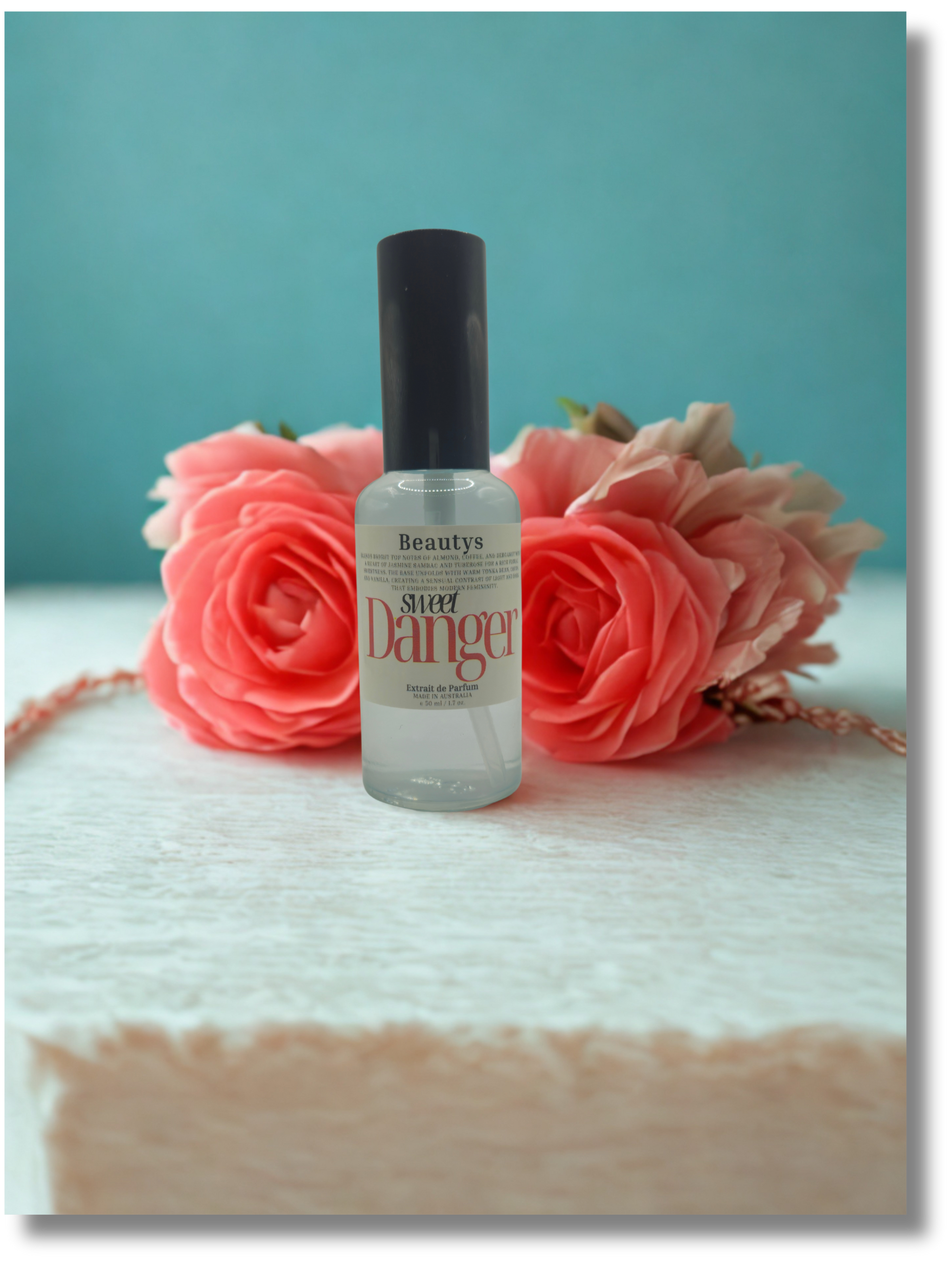 Sweet Danger perfume bottle by Beautys Tasmania, handcrafted luxury fragrance for women.