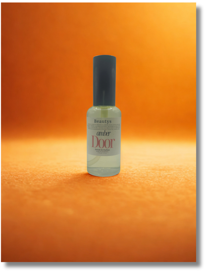 Bottle of 'amber door' on an orange background